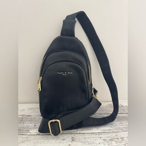 Inicat Sling Bag. Black and Gold.